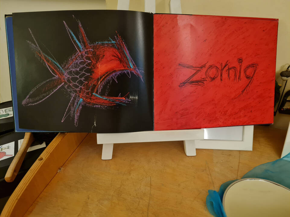 Ein Fisch und das Wort zornig.